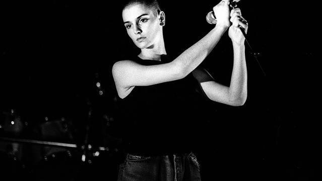 Irish singer Sinead O'Connor performs at Paradiso, Amsterdam, Netherlands, 16 March 1988. (Photo by Paul Bergen/Redferns)