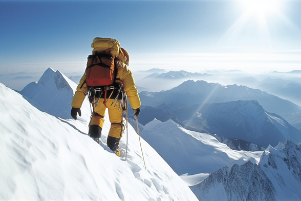 A mountain climber taking in the view