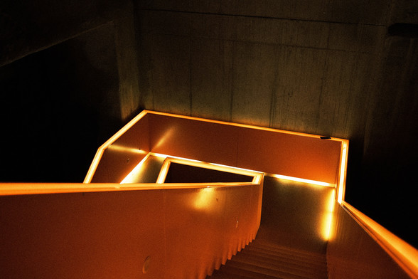 Red illuminated staircase of the Ruhr Museum