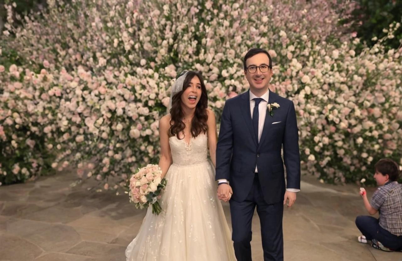 Image with seed 1546196420 generated via Stable Diffusion through @stablehorde@sigmoid.social. Prompt: John Oliver getting married to a peach 
