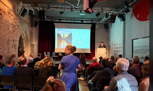 Photo taken from the back of the audience at the project end meeting at Utrecht Archive.
