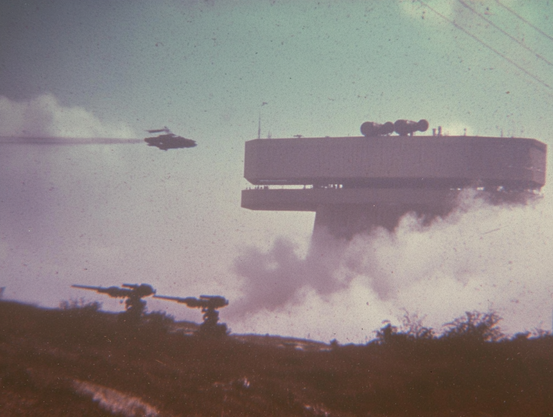 Futuristic scene with a large cylindrical structure and a flying aircraft.