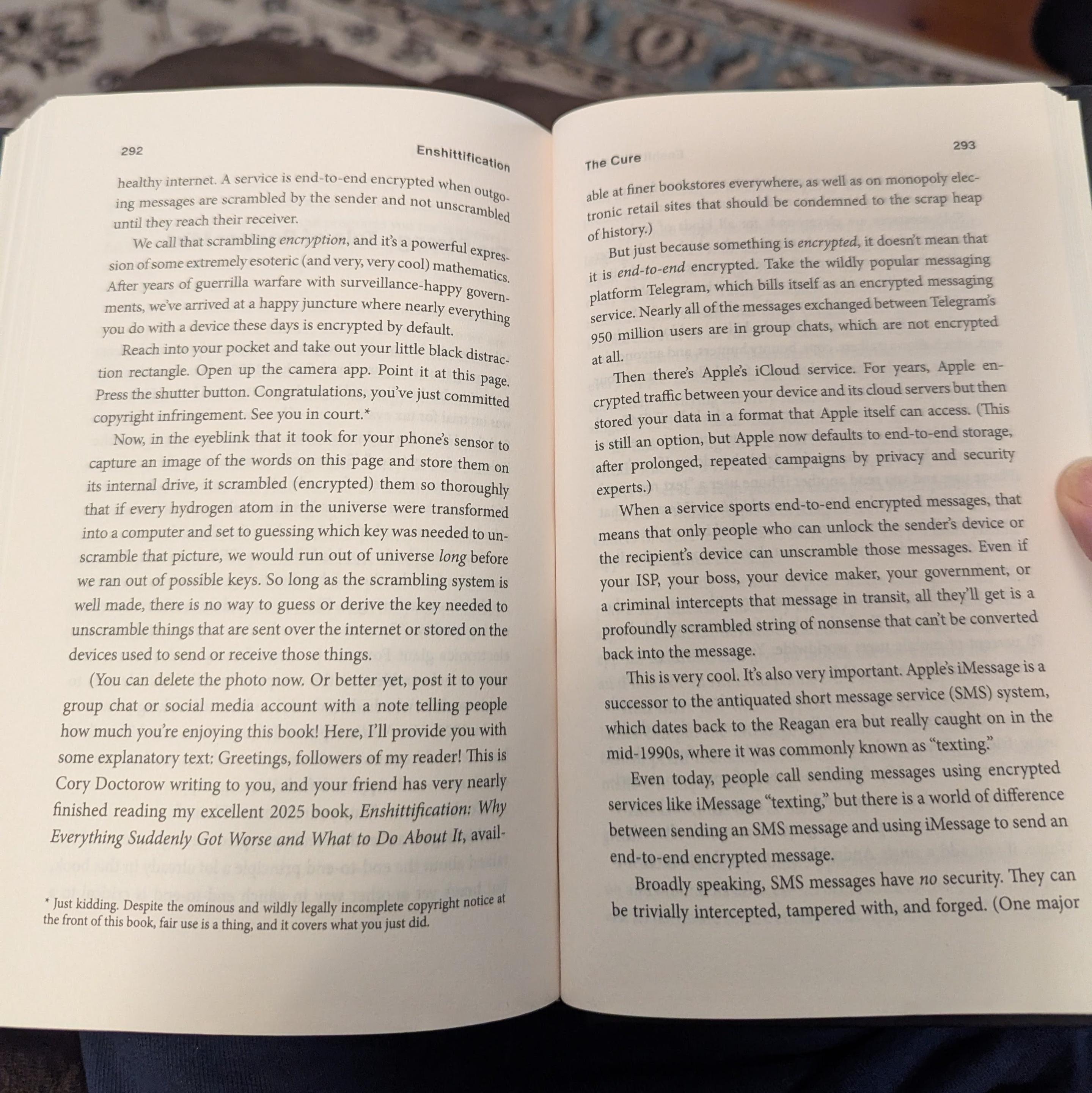 Photograph of the book "Enshittification" open to a spread of pp 292-293. The text invites readers to photograph this page and share it on social media with a message.