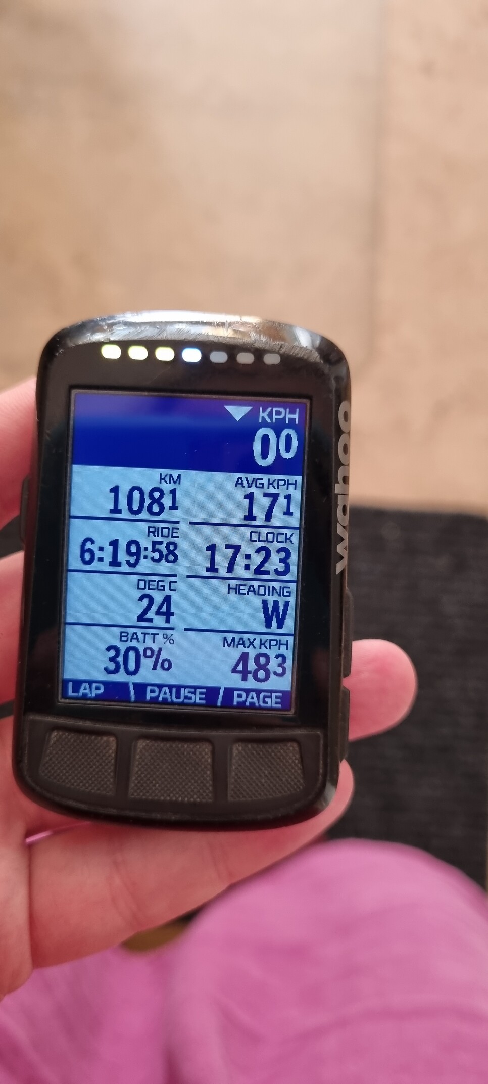 Bike computer in my hand showing 108km. at an average speed of 17,1 km/h.