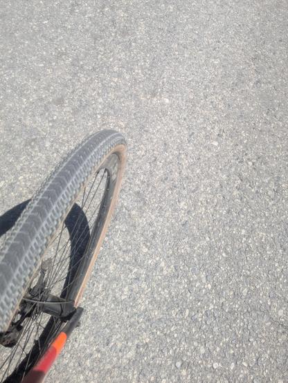 view of my front wheel while riding, smartphone directed down
