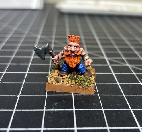 A dwarf slayer miniature from Warhammer