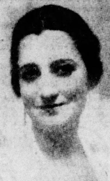 Frieda Klink, from a 1948 obituary; a white woman with dark hair and eyes, smiling