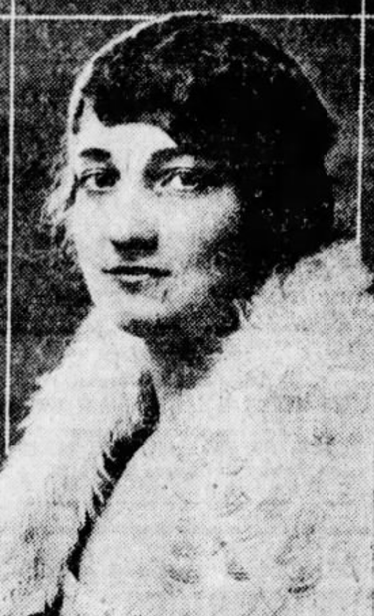 Frieda Klink, from a 1921 publication; a white woan with dark hair and eyes, wearing a white fur wrap