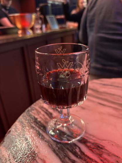 Glass of cherry vodka.