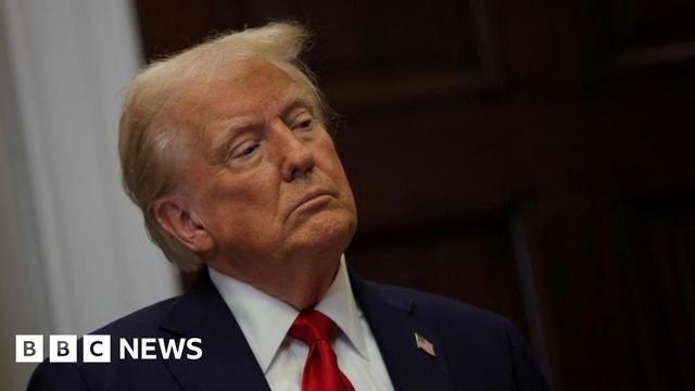 President Donald Trump looks on during a press conference about AI in January