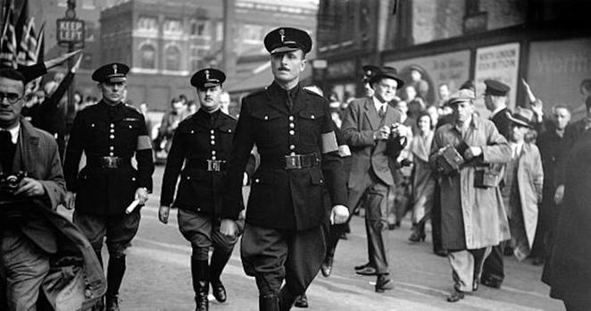  Sir Oswald Mosley, leader of the British Union of Fascists, marches with his Black Shirts to the East End of London. He and his followers never recovered from what became known as the Battle of Cable Street when they were blocked by the local Jewish and Irish community from forcing a way through their area. Photograph: Getty Images