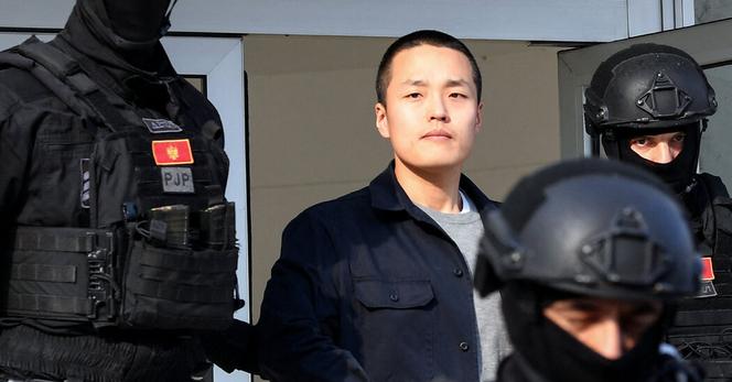 Police officers escorted the cryptocurrency entrepreneur Do Kwon out of court in Podgorica, Montenegro, last year.