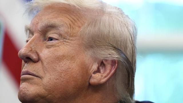 President Donald Trump listens in the Oval Office of the White House, Monday, Sept. 15, 2025, in Washington. (AP Photo/Alex Brandon)