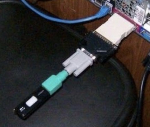 USB drive connected through a bunch of adapters in a horrifying way.