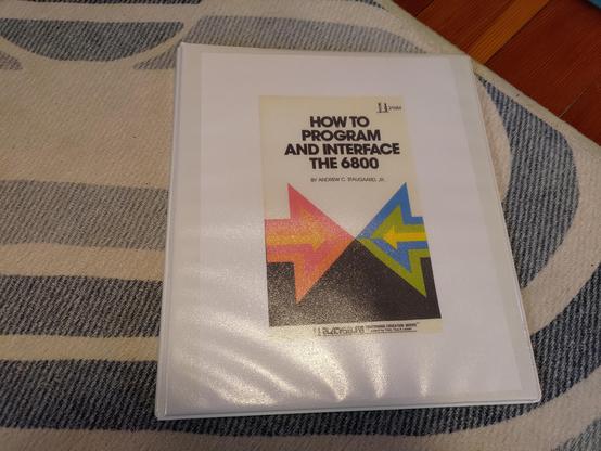 A 3/4 inch binder with a color printed copy of the cover of "How to Program and Interface the 6800" by Andrew C. Staugaard, Jr.

I found this book on archive.org while looking through 6800-series resources.