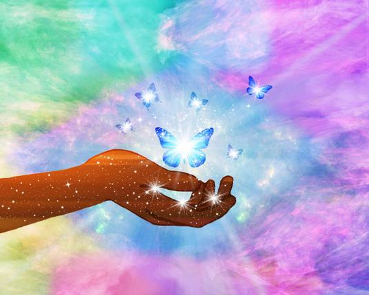A hand is outstretched in front of purple, pink, blue, green, and yellow clouds.  Above the hand floats a group of glittering blue butterflies surrounded by bright stars.  Beams of light shine from where the butterflies float above the hand.