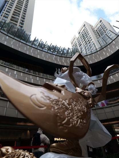 Looking up from the bottom of the spear held by a statue of Guan Yu at a mall in China