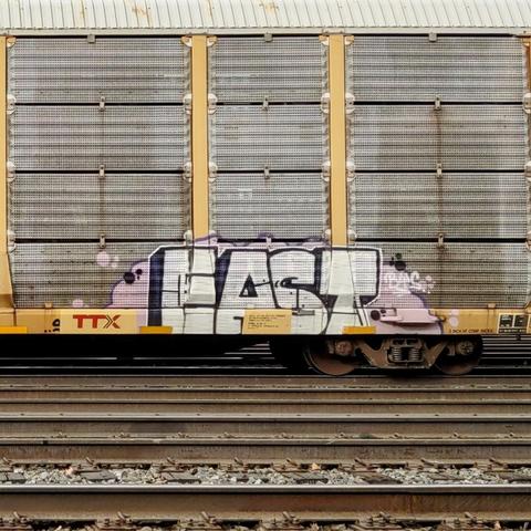 Train car with graffiti rolling through Kamloops BC Canada