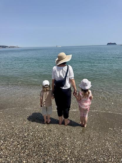 The beach of Málaga in Andalusia. It's me with my kids.