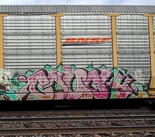 Train car with graffiti rolling through Kamloops BC Canada