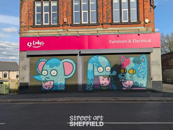 Shop shutters painted with cartoon style characters wearing hats representing a mouse, dog and a cat