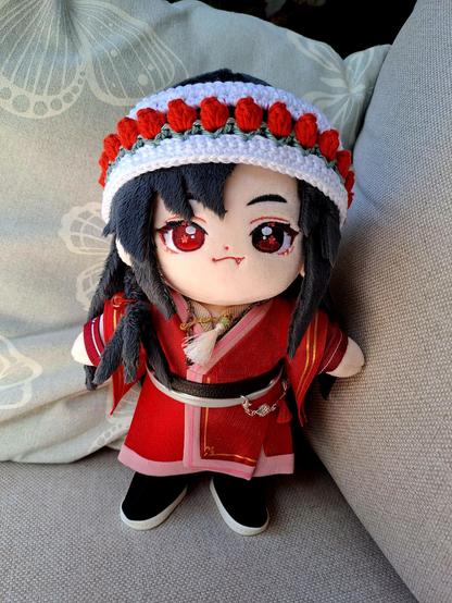 fafa minidoll with san lang's outfit, no eyepatch and a crocheted head band with red tulips