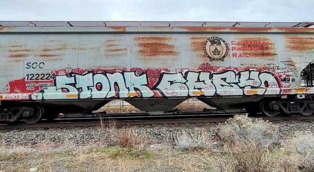 Train car with graffiti rolling through Kamloops BC Canada