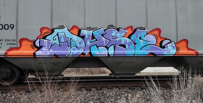 Train car with graffiti rolling through Kamloops BC Canada