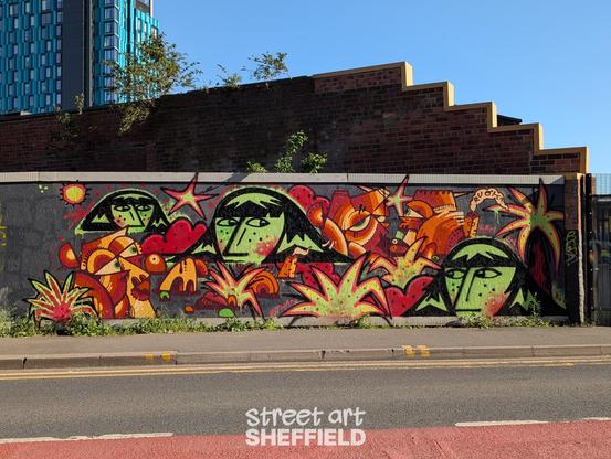 Graffiti of expressive faces rendered in two contrasting approaches: Ruok's abstract, angular designs and Ethan Lemon's more figurative, portrait-like depictions