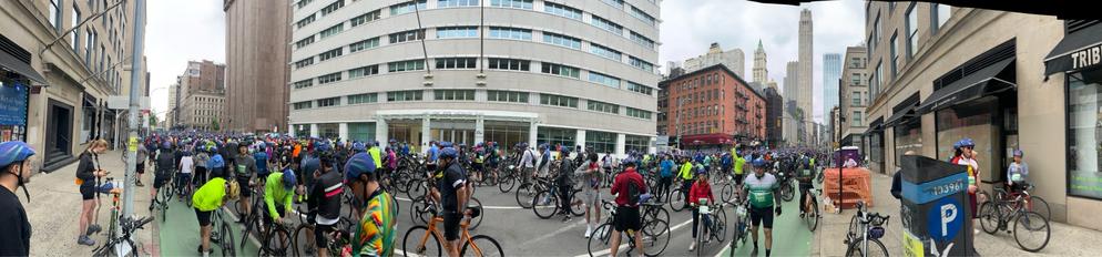 Thousands of cyclists gather on Thomas street to begin the five borough bike tour
