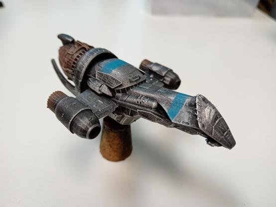 Model of a Firefly-class transport from the 'Verse, grey with blue markings.