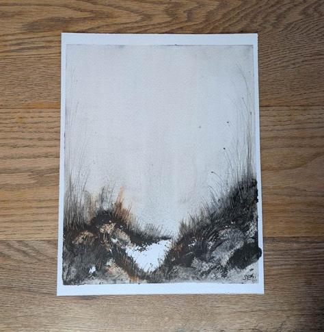 This is a atmospheric watercolor landscape in 8 x 10 portrait orientation. I used Daniel Smith hematite genuine (a warm black) and burnt umber. These earth tones create a pleasant atmosphere with the granulation from hematite genuine and the warmth of burnt umber. That warmth comes through on the left side of the composition. The rugged foreground leans into dark values with peaks of medium values and a few flecks of the white watercolor paper visible. The center of the the foreground is a triangular swatch of the white watercolor paper giving some depth to the composition. The granulating effects of hematite genuine are seen hanging in the light values of the atmosphere in vertical swatches. Long grasses add movement above the horizon line and shorter grasses provide texture in the foreground.