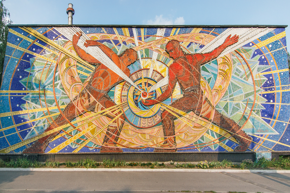 a mosaic of two people with a bright light between them symbolizing modern blacksmiths