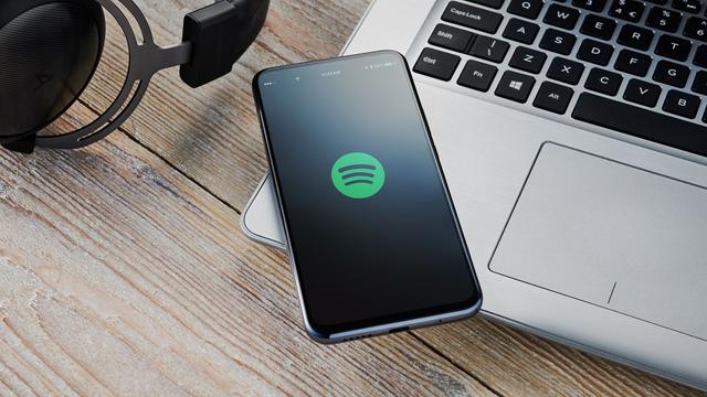 Editorial Use onlyMandatory Credit: Photo by Olly Curtis/Future/REX/Shutterstock (10139252ay)An Android Smartphone With The Spotify Music Logo Visible On Screen2018 Apple MacBook Air Product Shoot - 19 Nov 2018