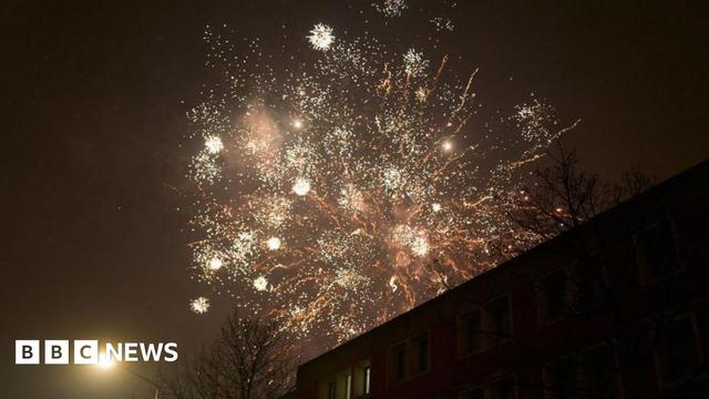 Fireworks in the night sky. | Image source, Pierre Crom/Getty Images