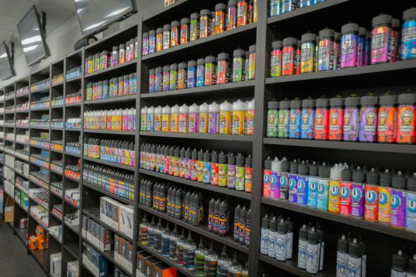Many different flavours of e-liquid vapes in a vape shop. | Bill Allsopp/Loop Images/Universal Images Group via Getty Images