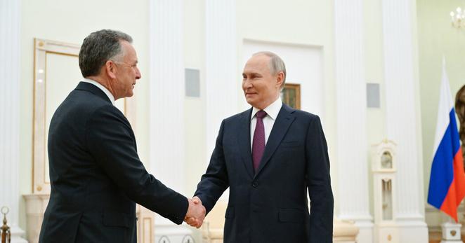 Russian President Vladimir V. Putin greets President Trump’s special envoy Steve Witkoff before their talks at the Kremlin in Moscow on Friday.