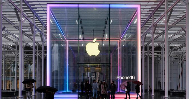 Some customers raced to buy iPhones before prices went up, helping lift sales.
