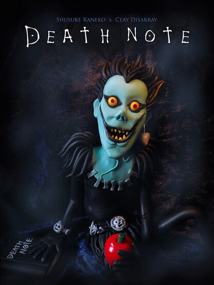 My poster for Death Note with my model of Ryuk looking at the camera while resting on his Death Note book and holding a red apple.