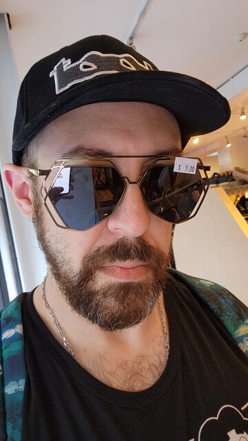 Your humble author modeling a $5 pair of funktacular sunglasses