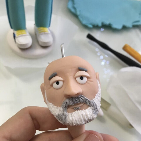 A process image of Steve's disembodied head with his legs in the background