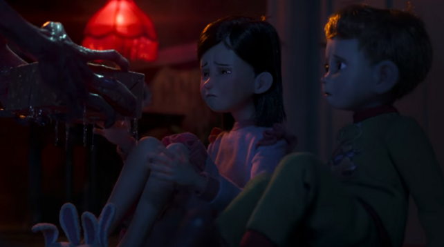 A pair of red hands gives a wraped gift to a sister and brother, who look on in horror.