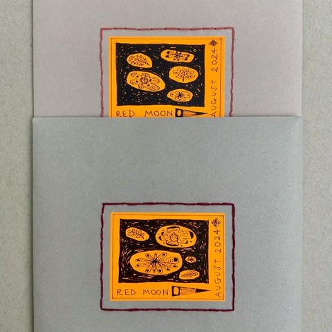 Here are two of the envelopes with sewn frames and illustrated stickers. The thread colours are slightly different shades of red. 