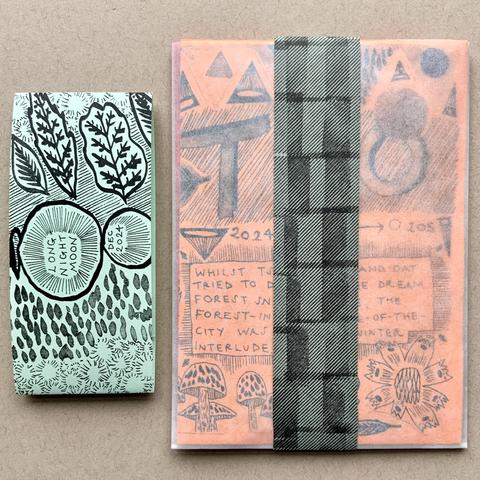 Here is the set with one of the strips taken off and put to the side. The strip remaining is hand-printed with a stamp.