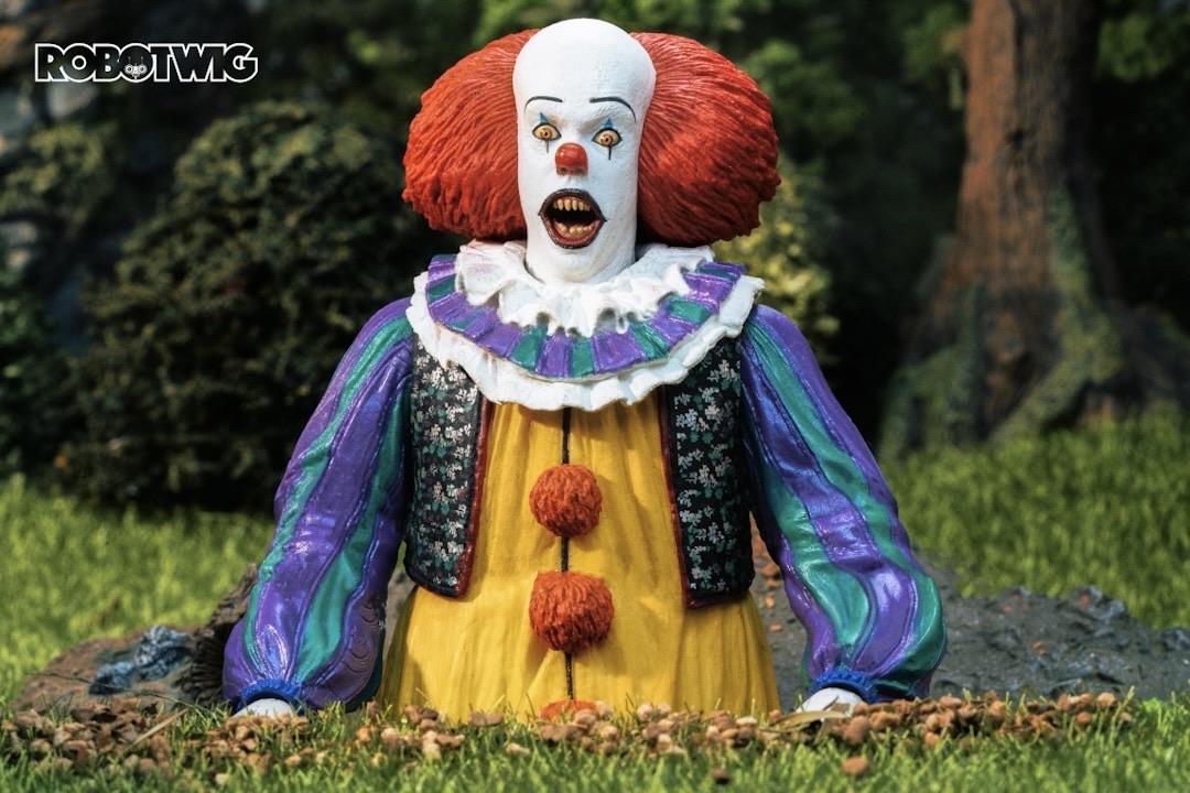 Pennywise pops out of a freshly dug grave
