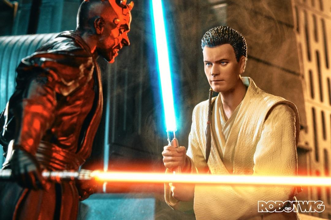 Obi Wan and Darth Maul face off in a Lightsaber battle