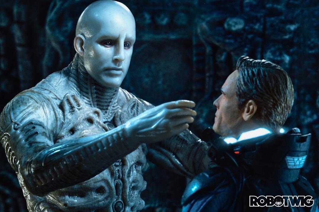An engineer approaches David holding its hands up ready to touch David's face