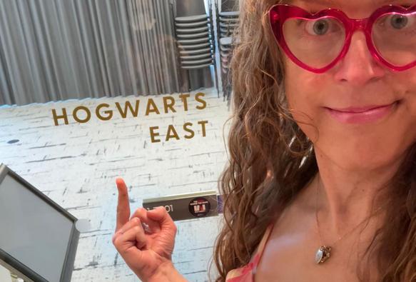 a photo of me giving the middle finger to a room labeled "Hogwarts East"
