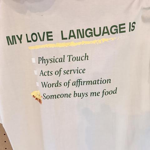 Photo of a tshirt that says my love language is ‘someone buys me food’
