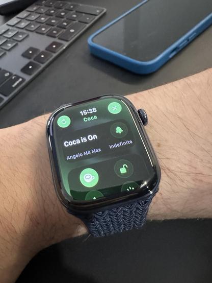 Coca running on a series 12 Ceramic Blue Apple Watch